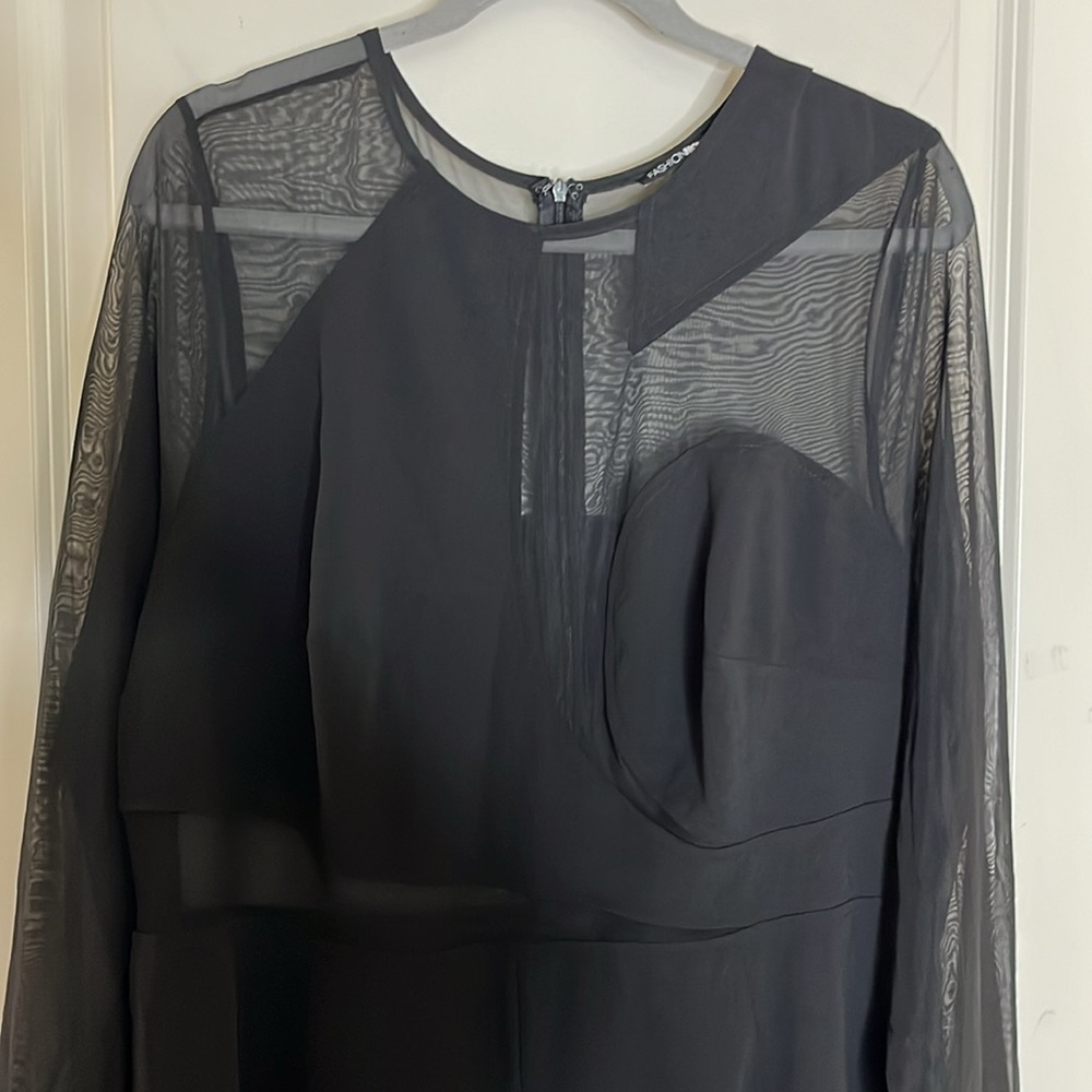 Ladies Zip Up Jumpsuit With A Hint Of Sheer. - image 3